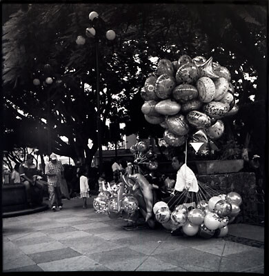 At the zocalo in Cuernavaca, Mexico, was this guy selling balloons.